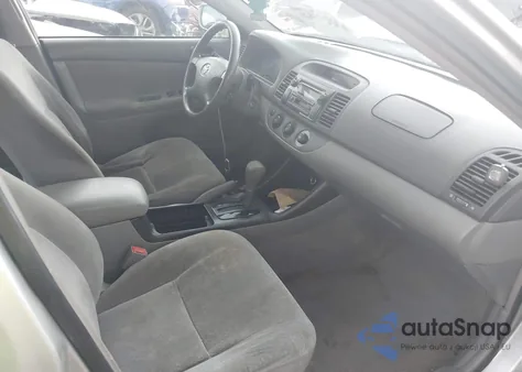 2003 Toyota Camry Le z USA, uszkodzony, nr VIN JTDBE32K830237656